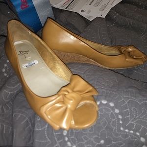 Tan wedges with bow peep toe